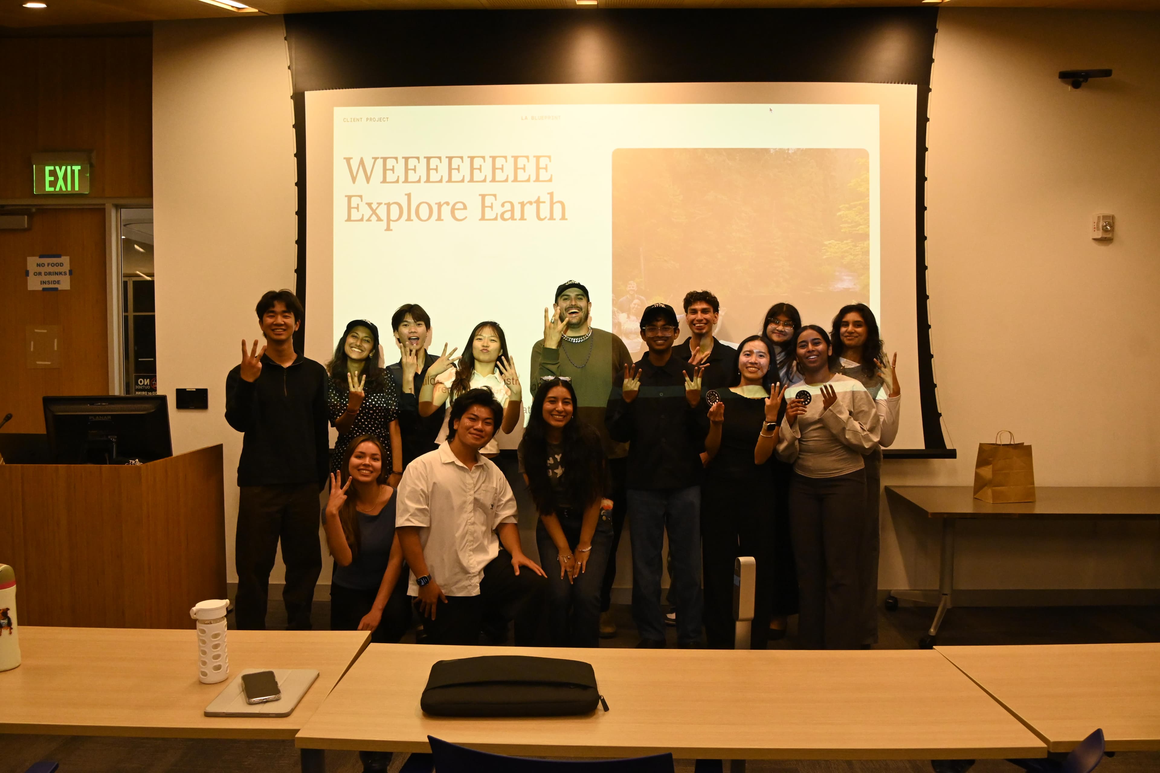 The design team presenting to We Explore Earth